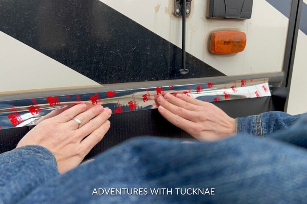 Putting 3M HVAC Tape on our RV skirting to help it stay on our RV