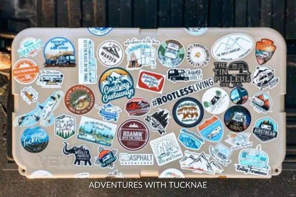 A Yeti Cooler covered in stickers