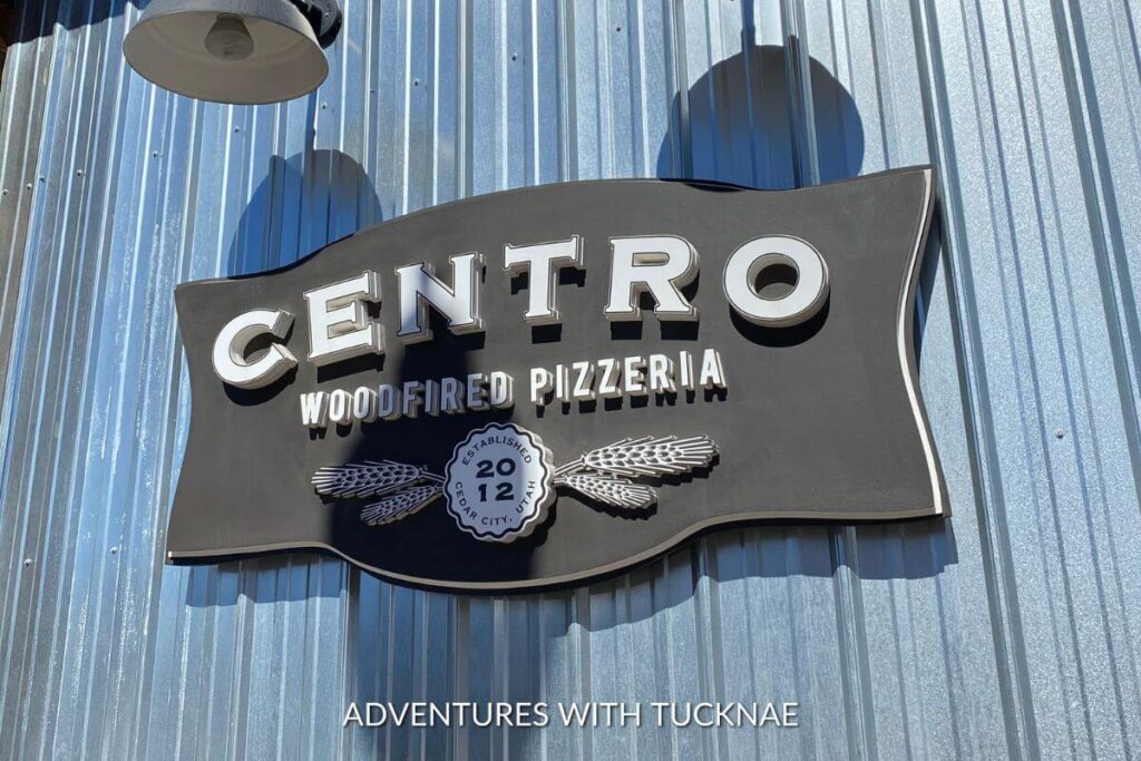 Business sign reading Centro Woodfired Pizzeria