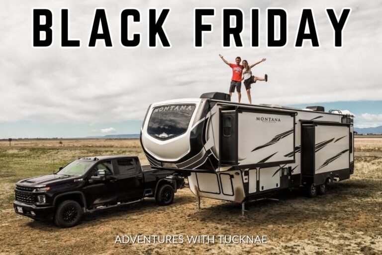 Couple standing on an RV camper with text reading "Black Friday"