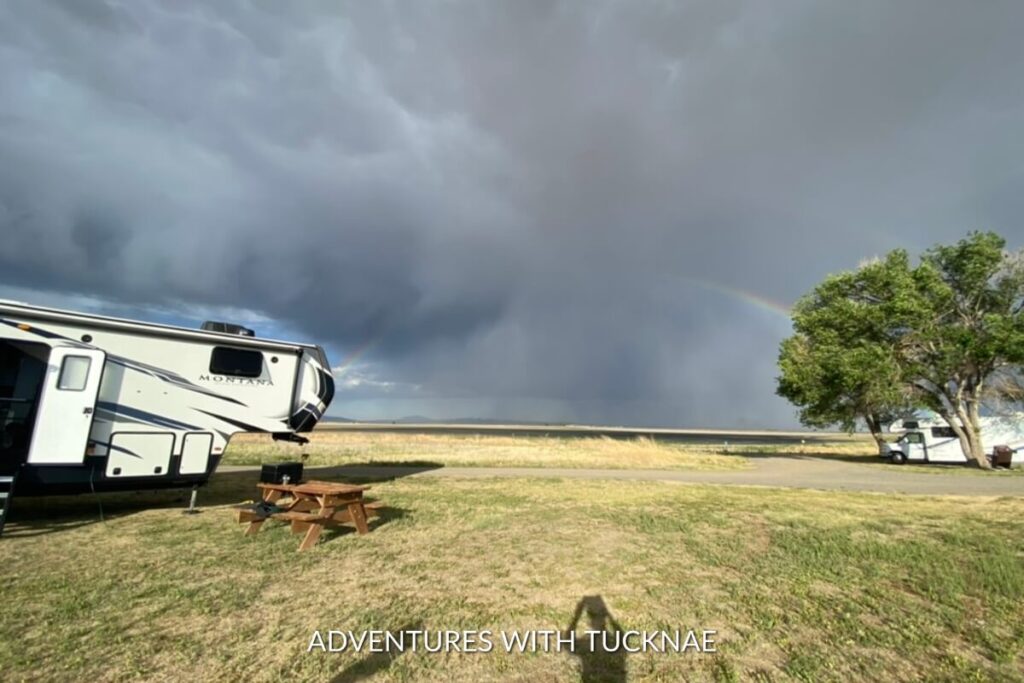 Camping during a storm with a rainbow at Maxwell National Wildlife Refuge