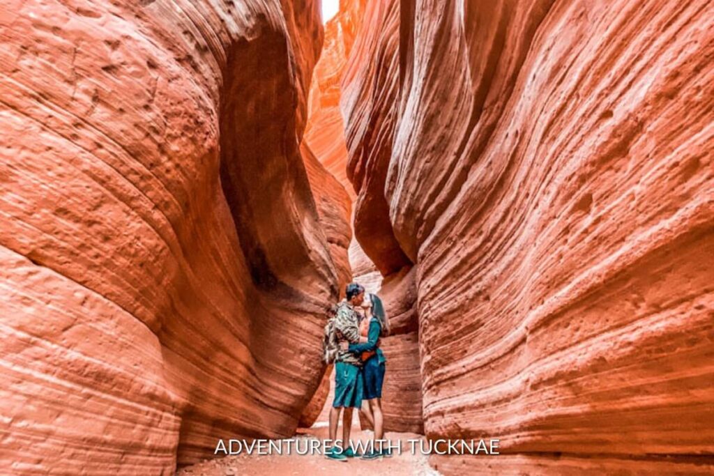 A couple kissing in Peekaboo Slot Canyon in southern Utah