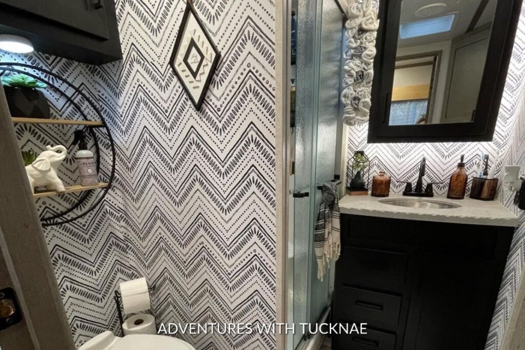 A beautiful RV bathroom renovated with wallpaper