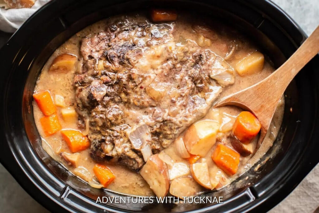 Tender and juicy slow cooker pot roast with carrots and potatoes, a staple meal for RV camping trips.
