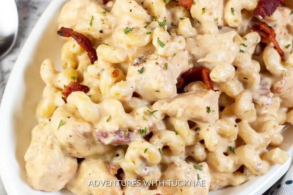 Creamy crockpot chicken bacon ranch pasta, a delicious and easy-to-make meal for RV camping enthusiasts.