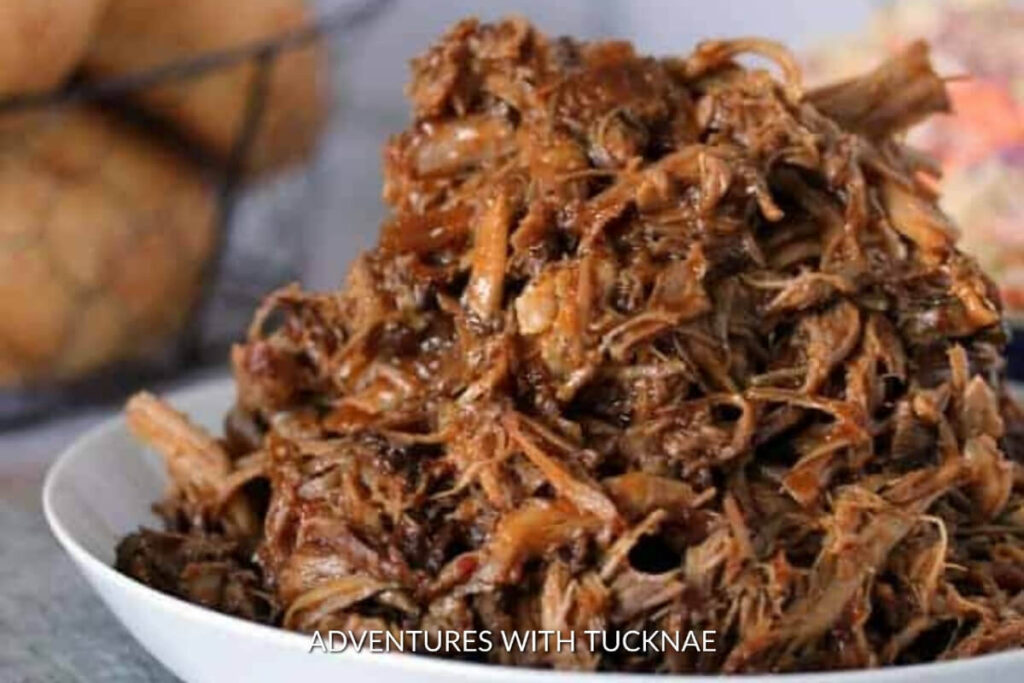 Tender slow cooker pulled pork, seasoned and cooked to perfection for an easy RV camping meal.