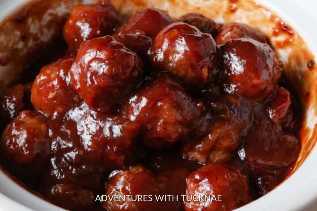 Sweet and spicy cranberry jalapeno meatballs, a unique crockpot dish for adventurous RV campers.