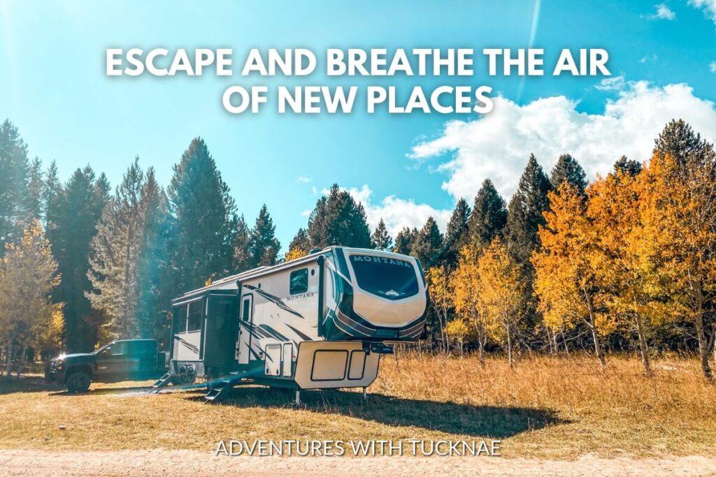 A pickup truck and RV parked in a forest setting with the quote 'Escape and breathe the air of new places.'