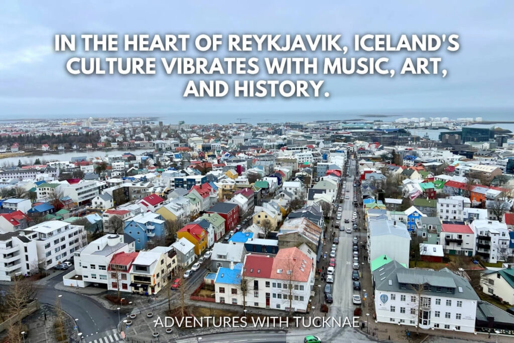 An aerial view of Reykjavik's colorful buildings and snowy streets, a bustling city alive with music, art, and history, captured under the quote 'In the heart of Reykjavik, Iceland's culture vibrates with music, art, and history.'