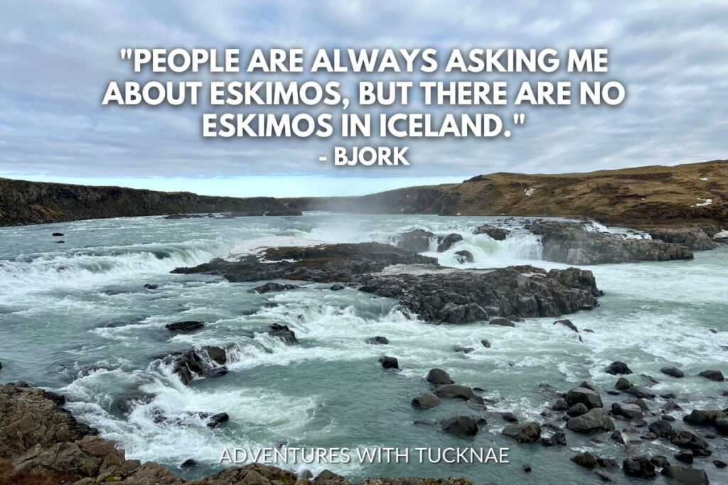 A turbulent Icelandic waterfall framed by rugged rocks with the quote, "People are always asking me about eskimos, but there are no eskimos in Iceland." by Björk.