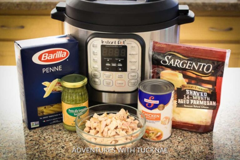 The ingredients for Creamy Instant Pot Pesto Chicken Pasta, an easy and delicious camping meal option.