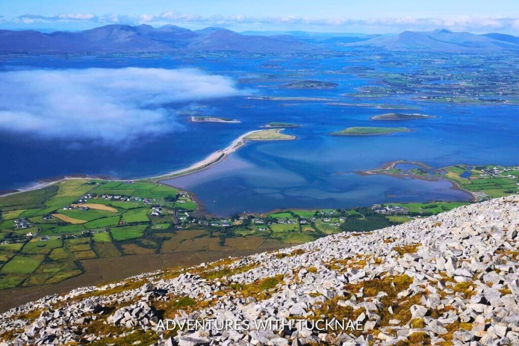 The majestic Croagh Patrick rises as a pilgrimage site and an Instagrammable backdrop in Ireland, with panoramic views worth the climb.