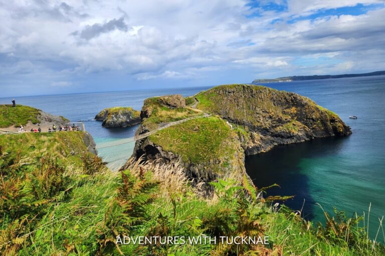 A serene view of the coastal path at Ballycastle, Northern Ireland, overlooking the turquoise sea, an idyllic scene for weekend breaks in Ireland.