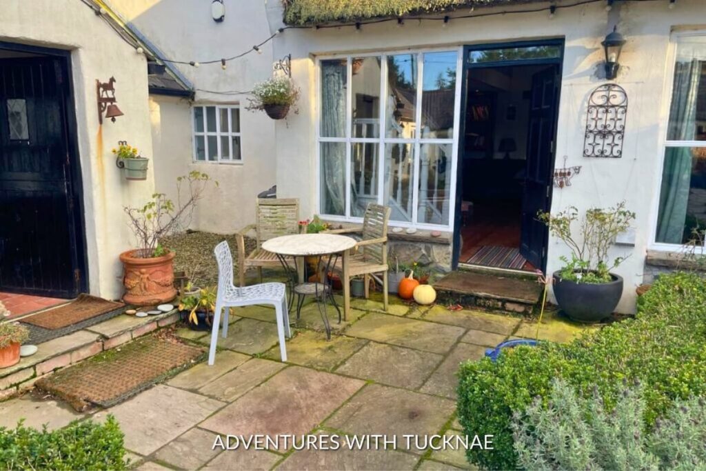 A charming patio of a Killinchy cottage, an ideal spot for a peaceful retreat during a weekend break in Ireland.