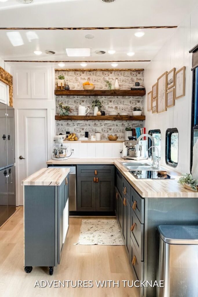 A bright and cheery RV kitchen renovation with open shelves and painted cabinets